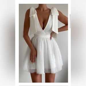 KARALYN MINI DRESS - BOW STRAP PLUNGE PEARL DETAIL DRESS IN WHITE